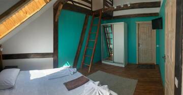 Фото номера Лофт Апартаменты Guculka Apartments г. Яремче 5