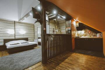 Фото номера Двухместный номер с 1 кроватью и панорамным видом Апартаменты Guculka Apartments г. Яремче 4