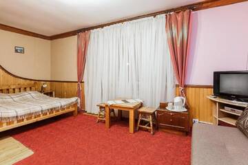 Фото номера Семейный номер с балконом Отель Vatra Hotel г. Яремче 5