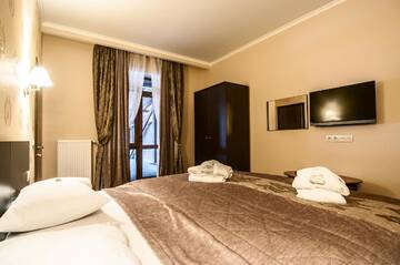 Фото номера Люкс с балконом и доступом в спа-центр Отель Romantik SPA Hotel г. Яремче 2