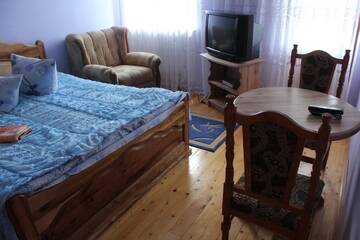 Фото номера Семейный номер Лоджи Cottage Gutsulia г. Яремче 3