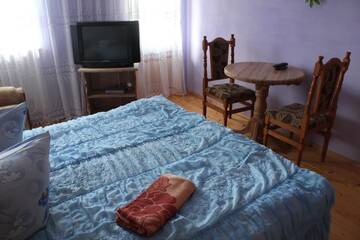 Фото номера Семейный номер Лоджи Cottage Gutsulia г. Яремче 2