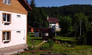 Фото номера Коттедж с 5 спальнями Загородные дома U Pana Ivana г. Яремче 6