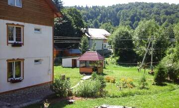 Фото номера Коттедж с 5 спальнями Загородные дома U Pana Ivana г. Яремче 7