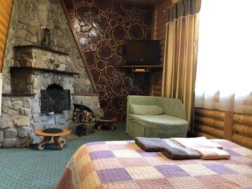 Фото номера Апартаменты с 2 спальнями и камином Отель U Yaroslava Hotel г. Яремче 13