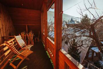 Фото номера Апартаменты с 3 спальнями и камином. Отель U Yaroslava Hotel г. Яремче 3