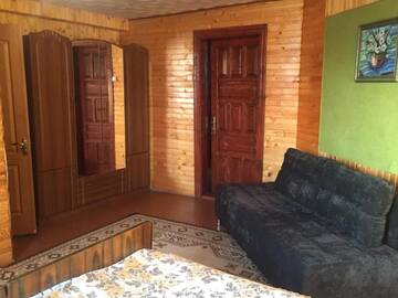 Фото номера Трехместный номер с видом на горы Лоджи Guest House U Myrona г. Яремче 4