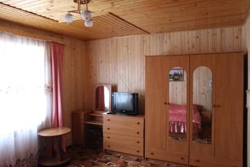 Фото номера Стандартный семейный номер Гостевой дом Gutsulochka Apartment г. Яремче 15
