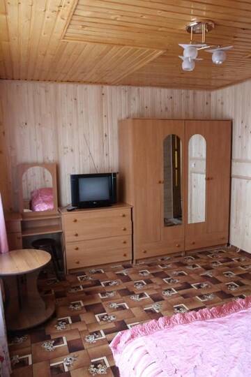 Фото номера Стандартный семейный номер Гостевой дом Gutsulochka Apartment г. Яремче 17