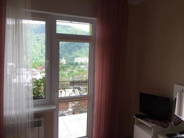 Фото номера Стандартный двухместный номер с 1 кроватью Гостевой дом Guest House Arnika г. Яремче 4