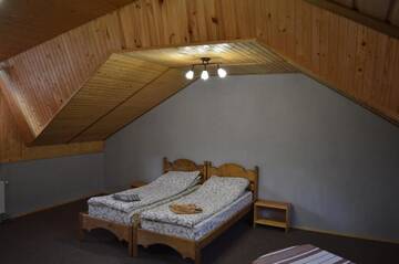 Фото номера Большой двухместный номер с 1 кроватью Гостевой дом Guest House Mansarda г. Яремче 7