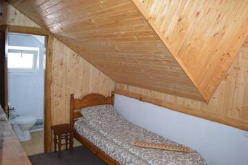 Фото номера Классический трехместный номер Гостевой дом Guest House Mansarda г. Яремче 5