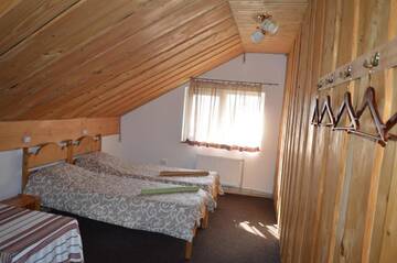 Фото номера Четырехместный номер Гостевой дом Guest House Mansarda г. Яремче 6