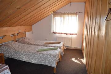 Фото номера Четырехместный номер Гостевой дом Guest House Mansarda г. Яремче 10