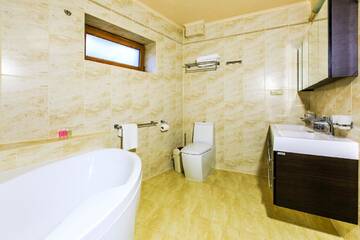 Фото номера Апартаменты с 3 спальнями Отель ATAVA family house г. Яремче 4