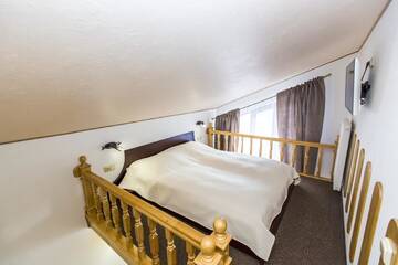 Фото номера Двухуровневый люкс Отель ATAVA family house г. Яремче 2