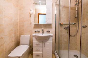 Фото номера Улучшенный двухместный номер с 1 кроватью и террасой Отель ATAVA family house г. Яремче 9