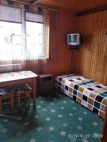 Фото номера Двухместный номер с 1 кроватью или 2 отдельными кроватями и дополнительной кроватью Гостевой дом Sadyba Markevychiv г. Яремче 3