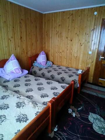 Фото номера Классический четырехместный номер Лоджи Sadyba Zavitaiko г. Яремче 5