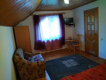 Фото номера Стандартные апартаменты Отель Oskolok Dovbusha Mini-Hotel г. Яремче 13