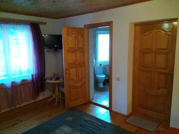 Фото номера Стандартные апартаменты Отель Oskolok Dovbusha Mini-Hotel г. Яремче 11