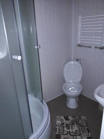 Фото номера Трехместный номер с ванной комнатой Гостевой дом Sadyba Ellada г. Яремче 6