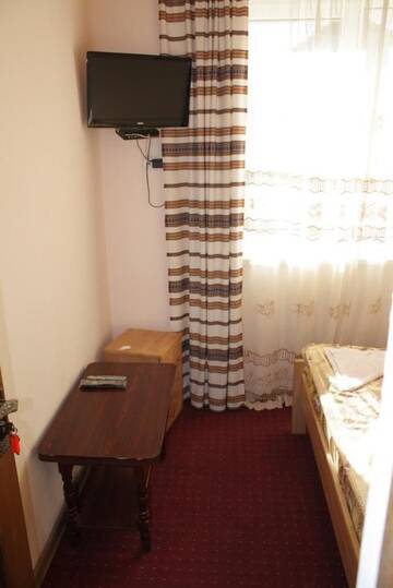 Фото номера Четырехместный номер с ванной комнатой Мини-отель Hotel Yaremche г. Яремче 7