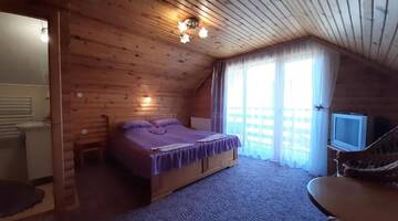 Фото номера Двухместный номер с 1 кроватью Гостевой дом Садиба Чорногора г. Яремче 4