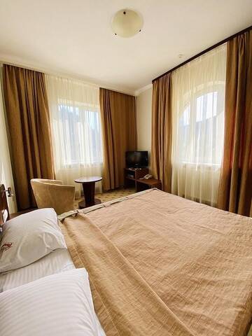 Фото номера Семейный полулюкс Отель Gerdan Hotel г. Яремче 7