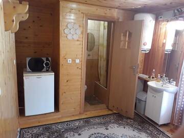 Фото номера Трехместный номер с балконом Лоджи Акорди Плеса г. Яремче 20