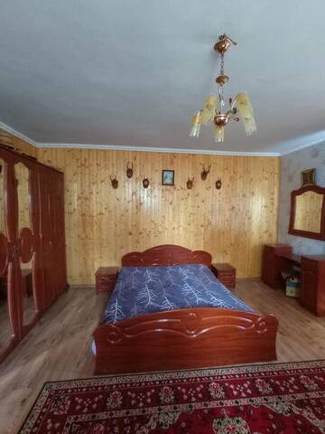 Фото номера Номер Делюкс (для 2 взрослых и 1 ребенка) Гостевой дом Роздоріжжя г. Яремче 2