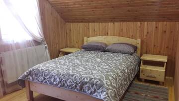 Фото номера Двухместный номер с 1 кроватью и террасой Загородные дома Смерековий двір г. Яремче 14