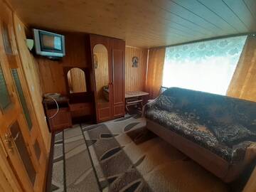 Фото номера Стандартный четырехместный номер Гостевой дом Kатруся г. Яремче 6